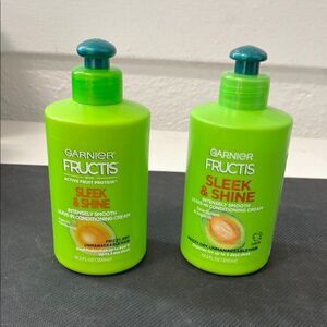 Two Garnier Fructis sleek & shine leave in conditioning cream never used